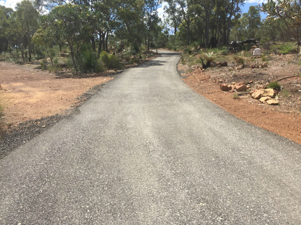 This is a photo of a hot spray & seal bitumen driveway which is in the process of being installed by Campbellfield Road Tech